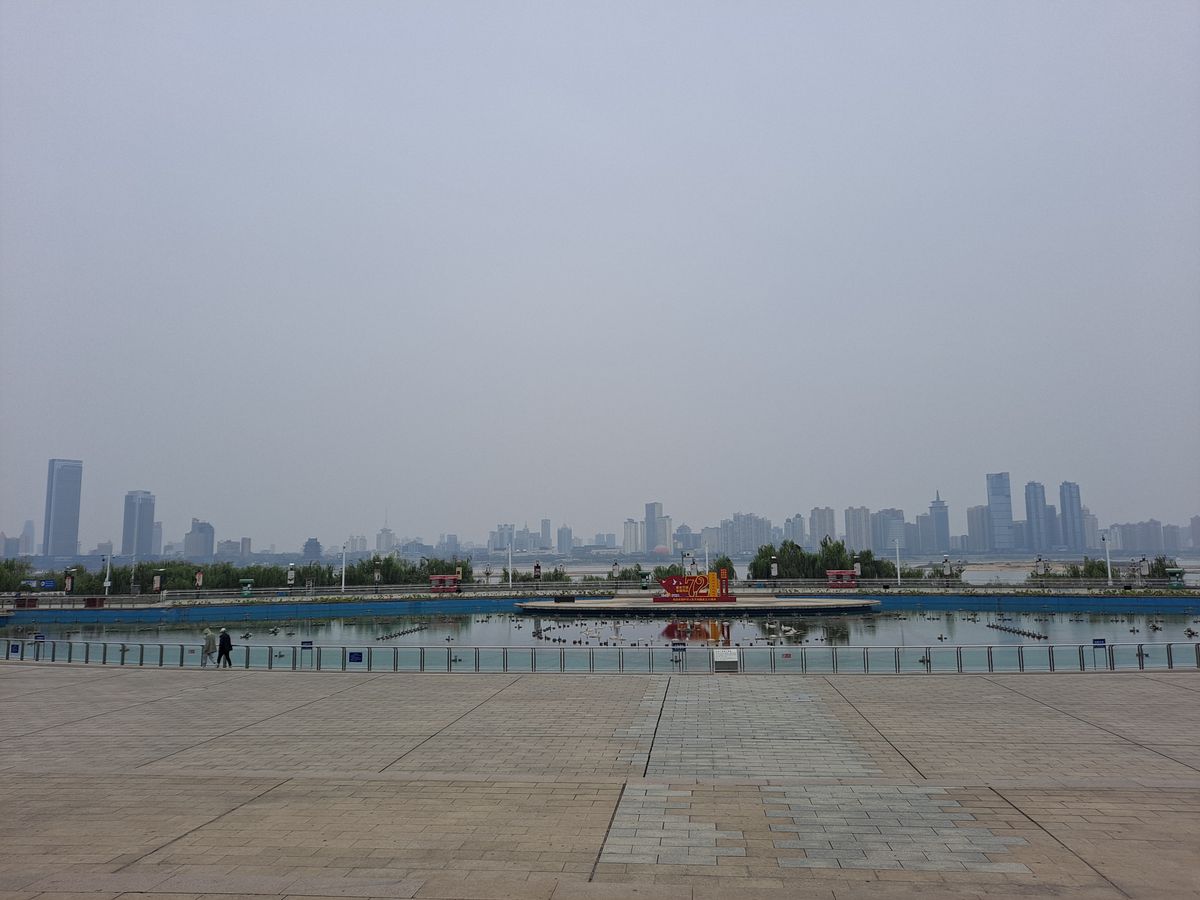 Qiushui Square on the Honggutan riverfront in Nanchang, home to the evening musical fountain show