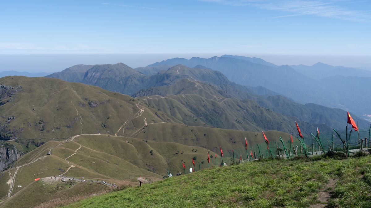 The Golden Summit (Jinding) of Wugongshan at 1,918 m, Jiangxi's highest point, ringed by the high alpine grassland