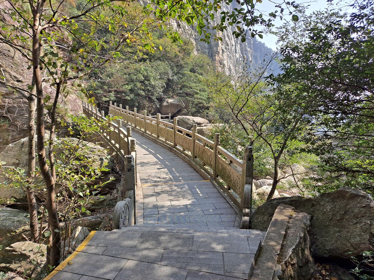 Green forested peaks and valleys of Lushan (Mount Lu), the cool UNESCO summer mountain you ride and stroll rather than climb