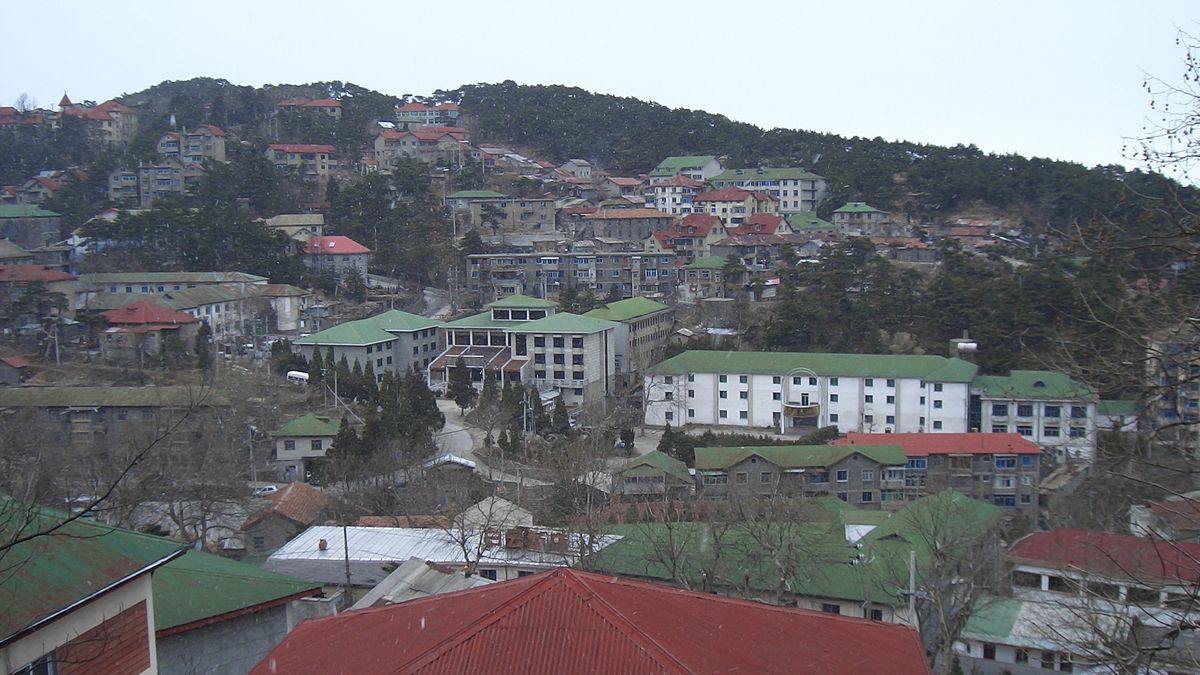 Stone early-20th-century European-style holiday villas in Guling town on Lushan, relics of its treaty-port heyday