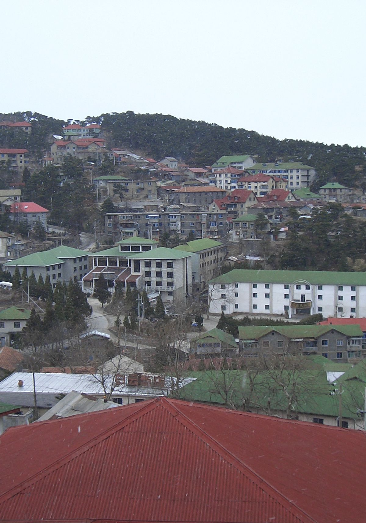 Stone early-20th-century European-style holiday villas in Guling town on Lushan, relics of its treaty-port heyday