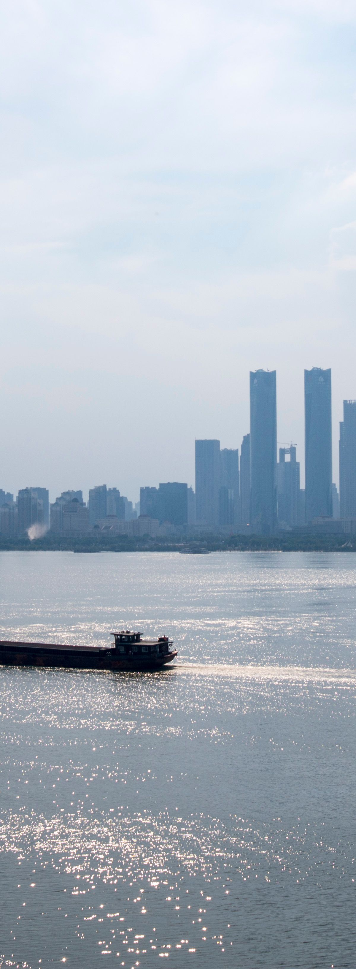 The modern Honggutan district skyline across the Gan River, viewed from Tengwang Pavilion
